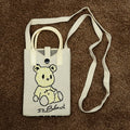 Off-White Canvas Mobile Sling Bag with Pixel Teddy Bear Print