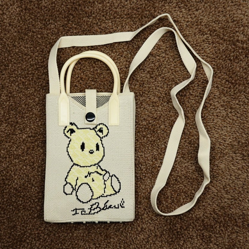 Off-White Canvas Mobile Sling Bag with Pixel Teddy Bear Print